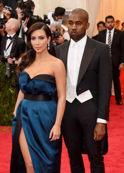 Kanye-West-in-ill-fitting-tailcoat-without-a-bow-tie-or-studs-but-pants-that-are-so-tight-they-wrinkle-643x900.jpg