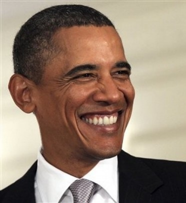 Obama-Smiles.jpg.b9b211050ab4328aafe356e51416f531.jpg